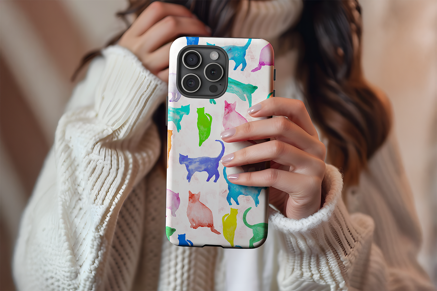 A cute girl holding our Abstract Cats design phone case