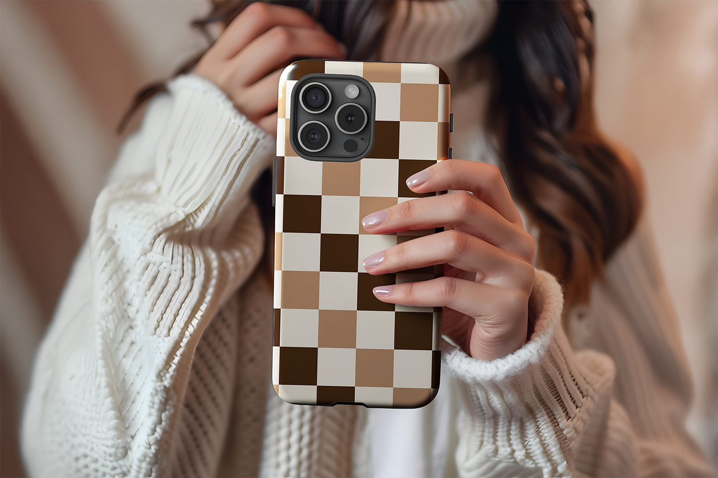 A cute girl holding our Chocolate Check design phone case