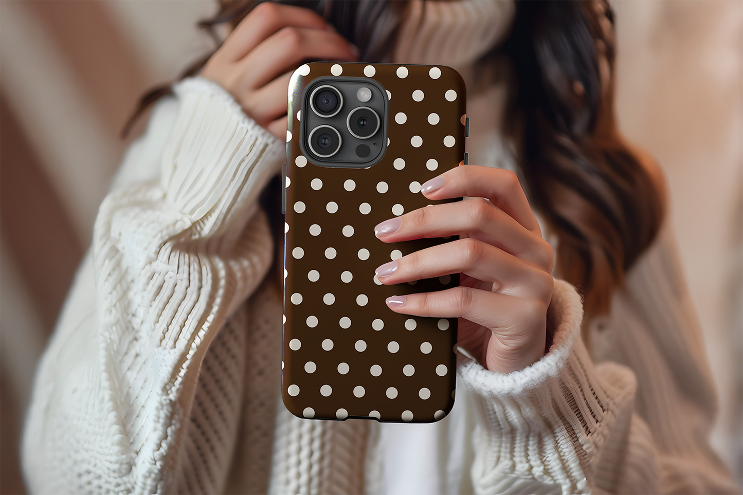 A cute girl holding our Chocolate Spot design phone case