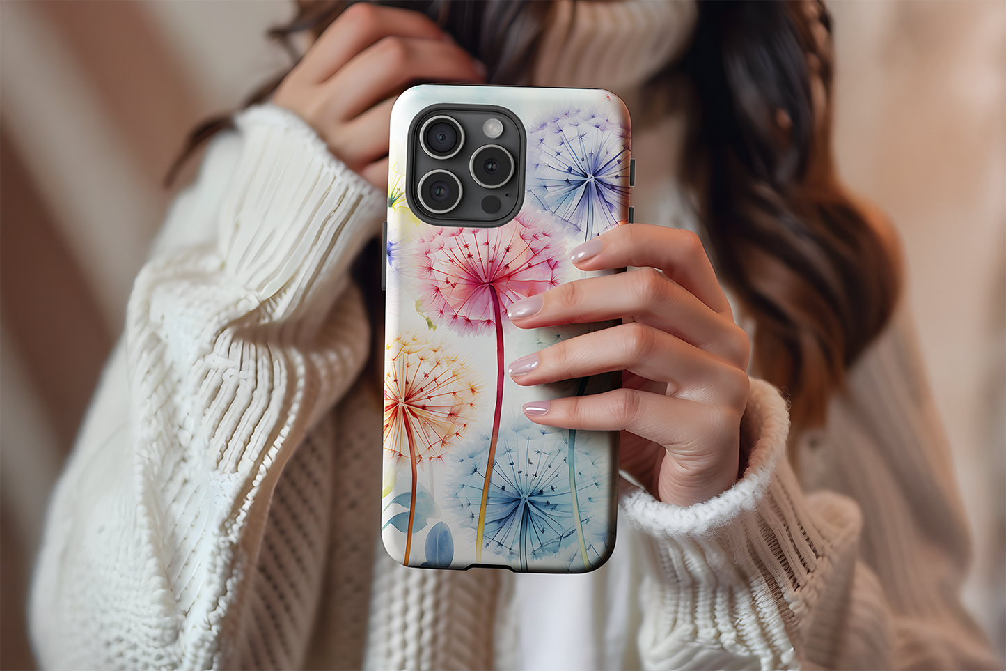 A cute girl holding our Dandelion Dream design phone case