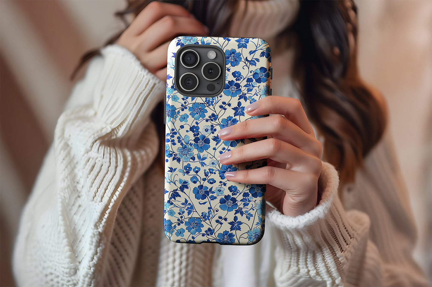 A cute girl holding our Floral Blues design phone case
