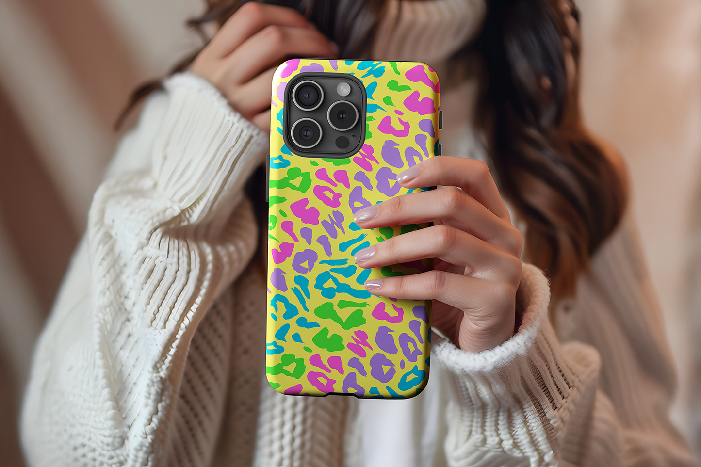 A cute girl holding our Jazzy Leopard design phone case