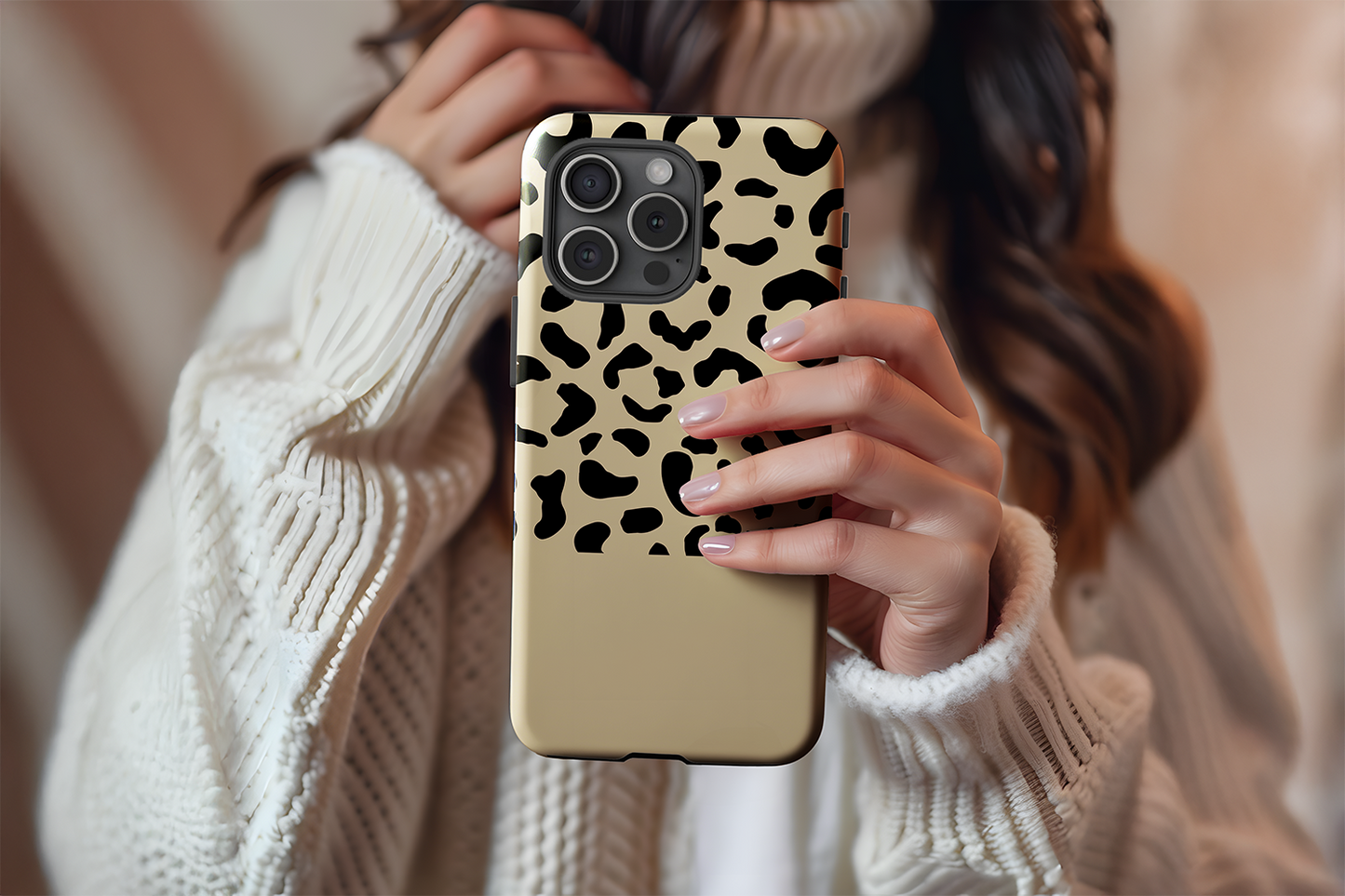 A cute girl holding our Mocca Leopard design phone case