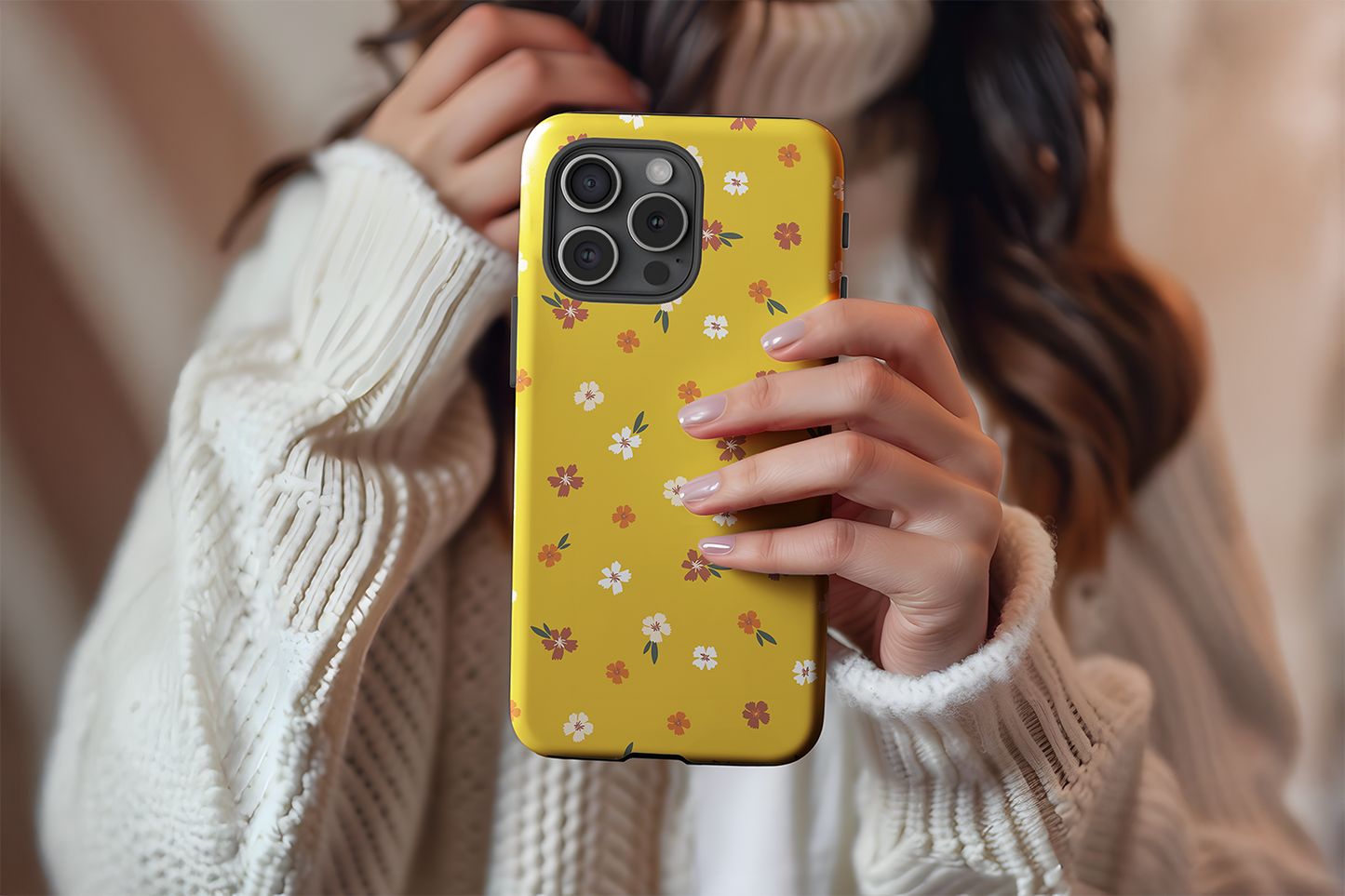 A cute girl holding our Mustard Floral design phone case