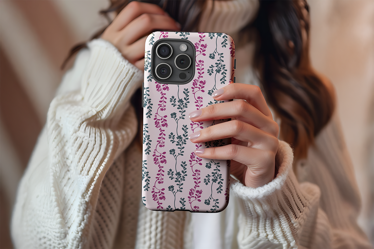 A cute girl holding our Pretty Pink Leaf design phone case