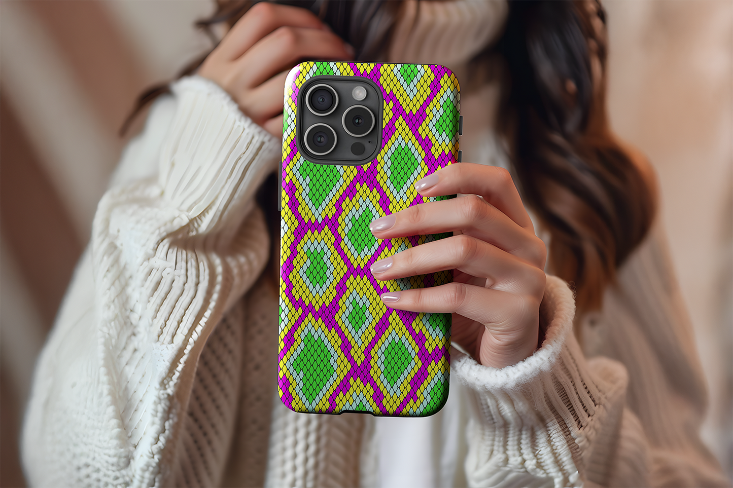 A cute girl holding our Snake Charmer design phone case