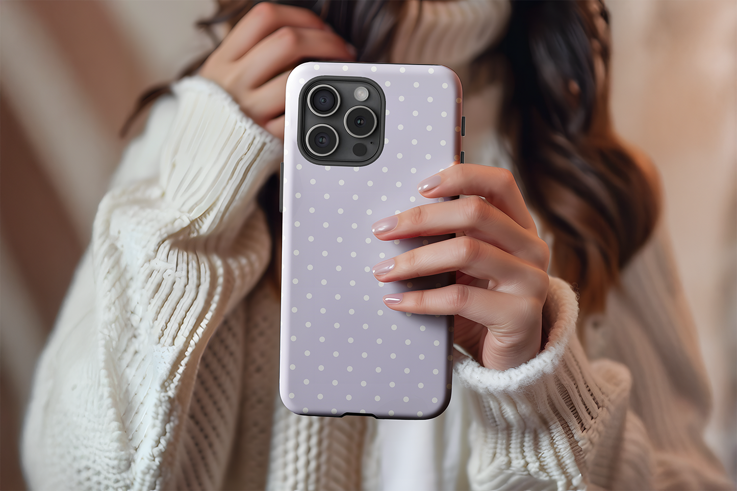 A cute girl holding our Spotted Lilac design phone case