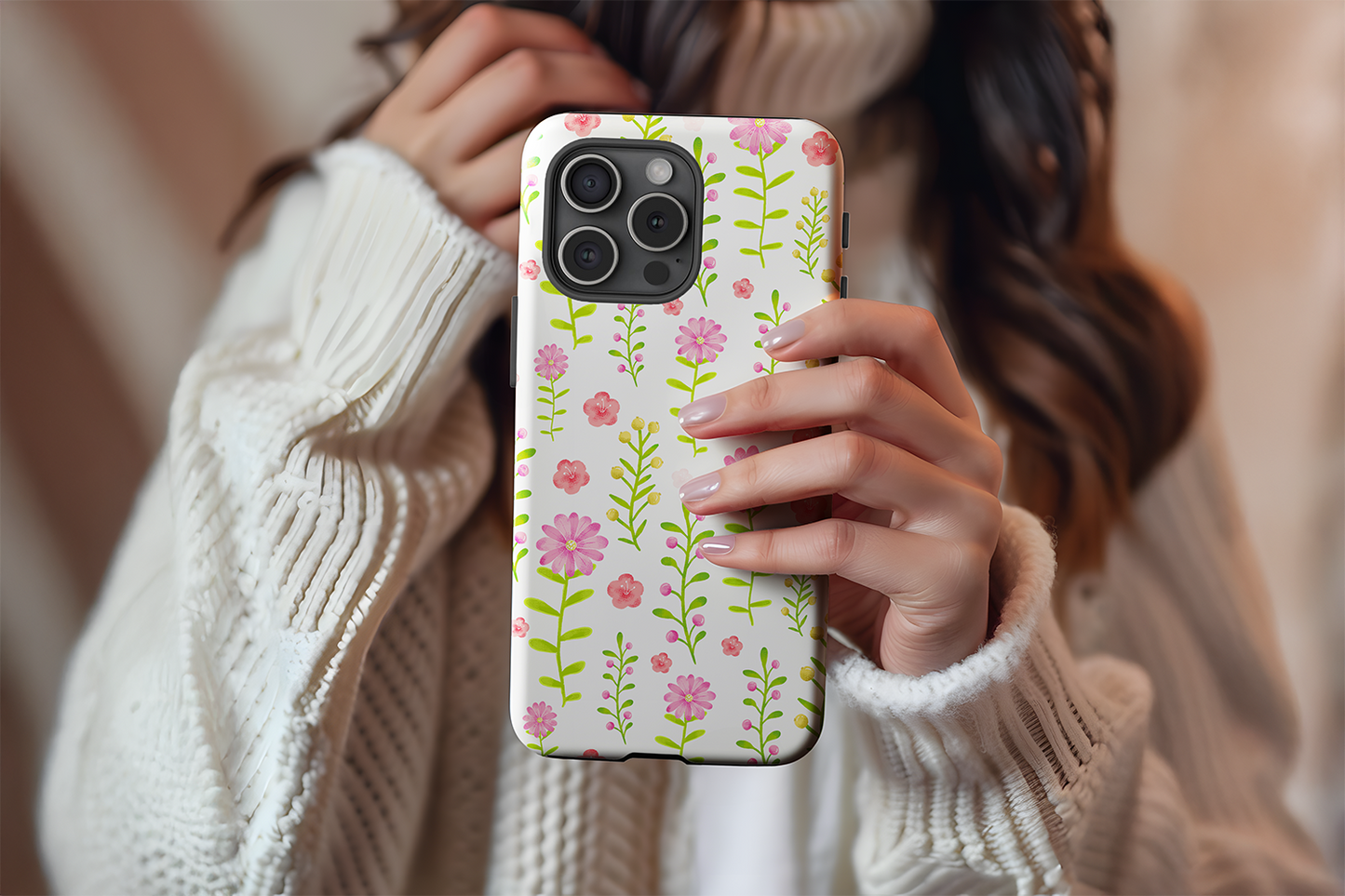 A cute girl holding our Summer Meadow design phone case