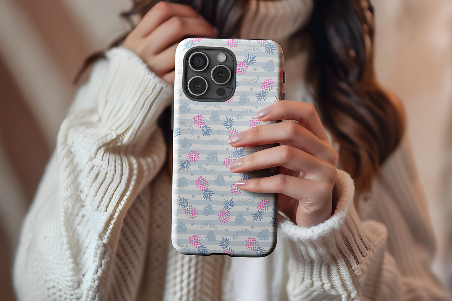 A cute girl holding our Tropical Taste design phone case