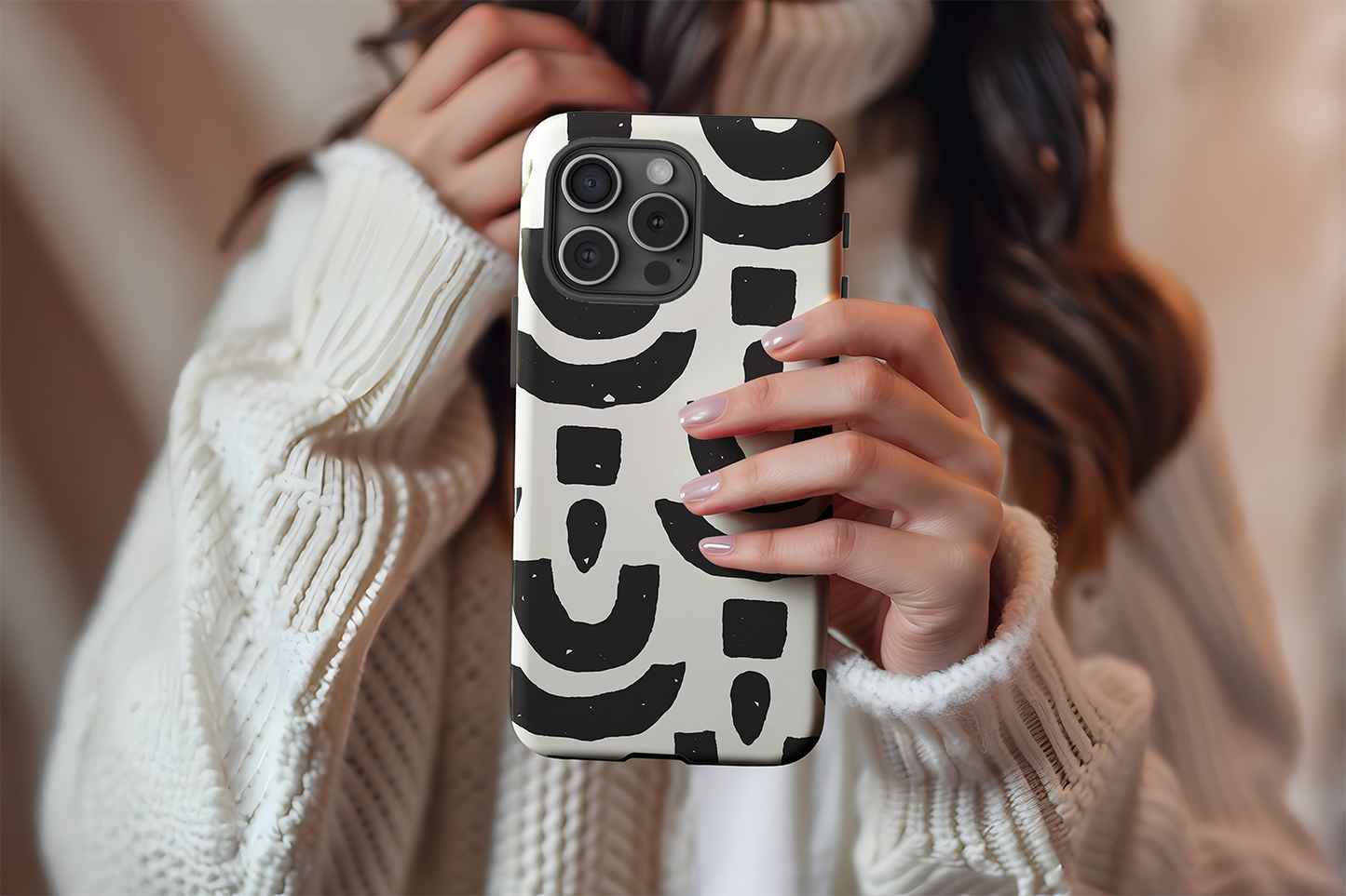 A cute girl holding our Abstract Shapes design phone case