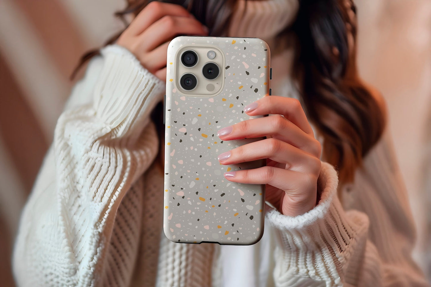 A cute girl holding our Dark Mosaic design phone case