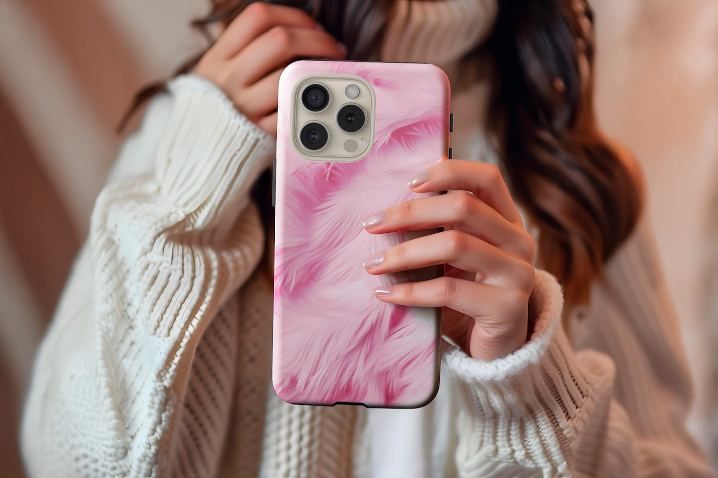 A cute girl holding our Pink Floof design phone case