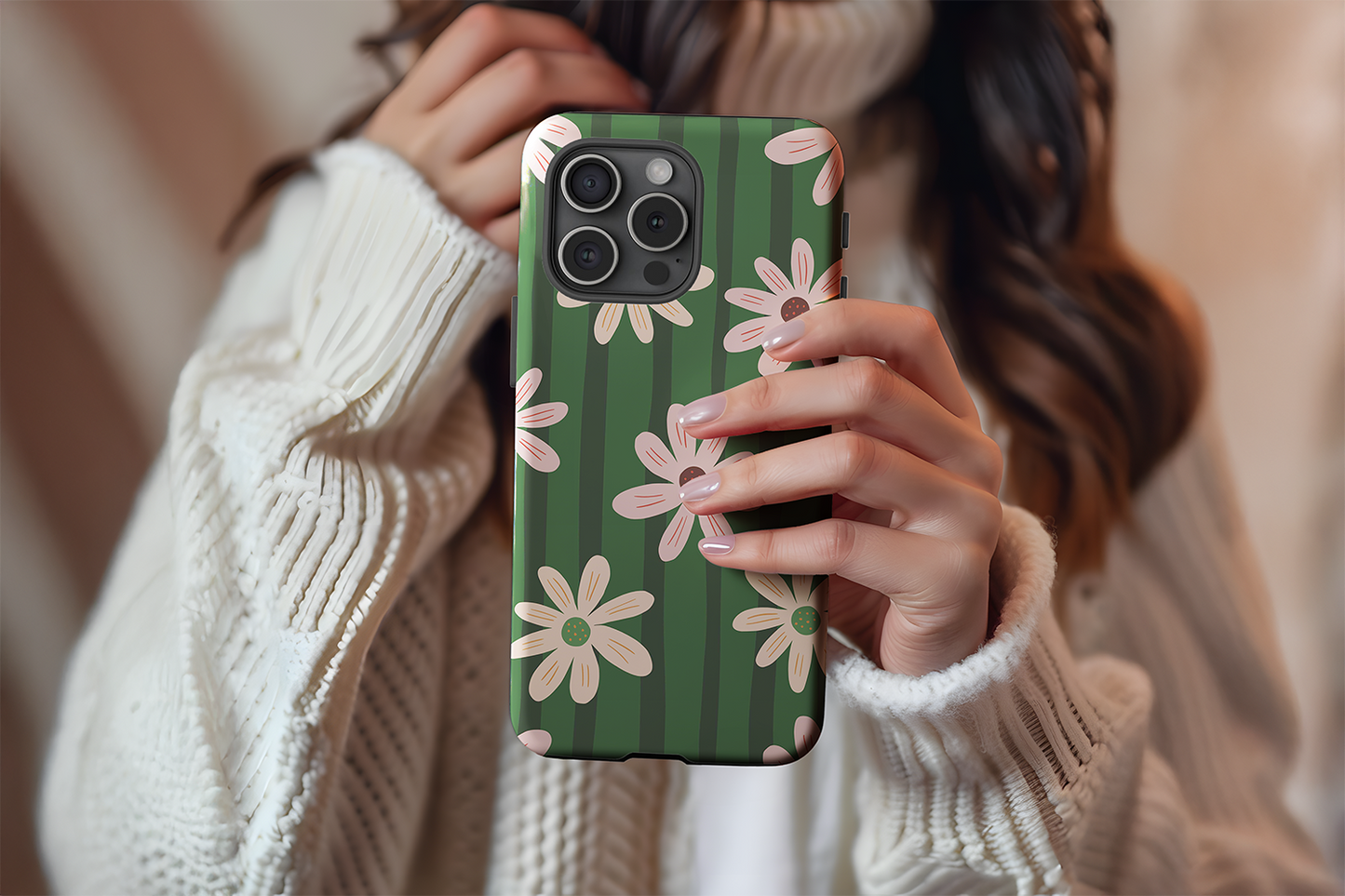 A cute girl holding our Vintage Daisy design phone case