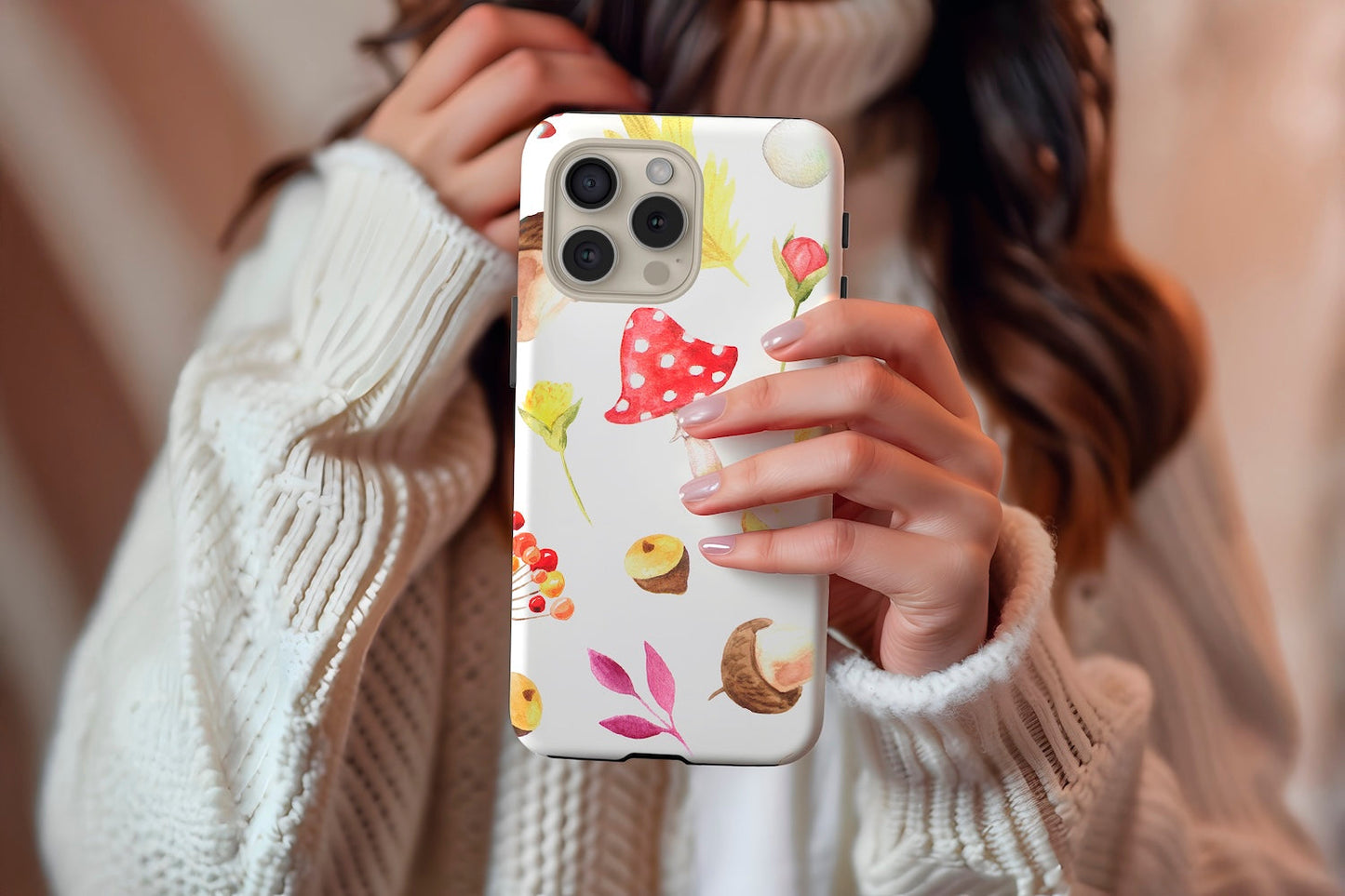 A cute girl holding our Watercolour Autumn design phone case