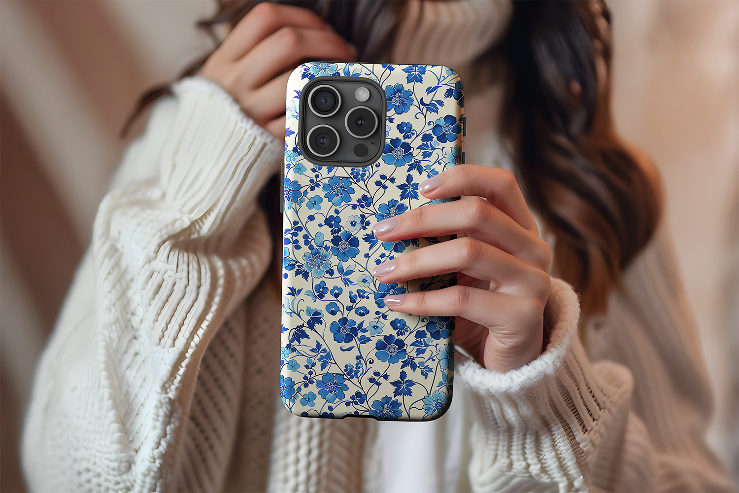 A cute girl holding our Floral Blues design phone case