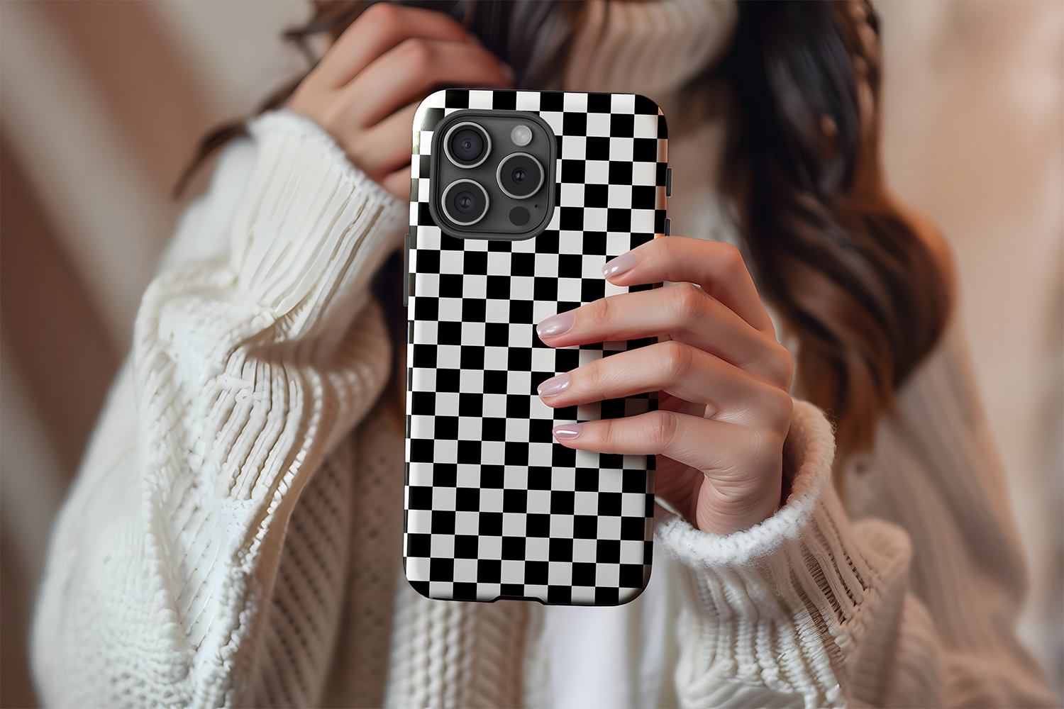 A cute girl holding our Mono Checkerboard design phone case