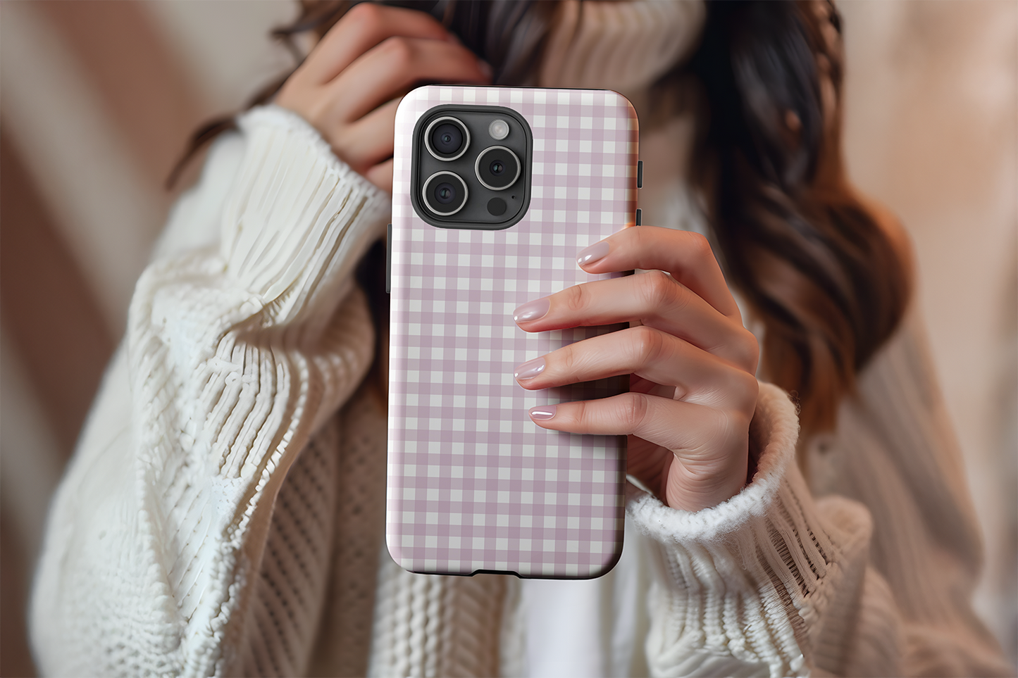 A cute girl holding our Purple Gingham design phone case