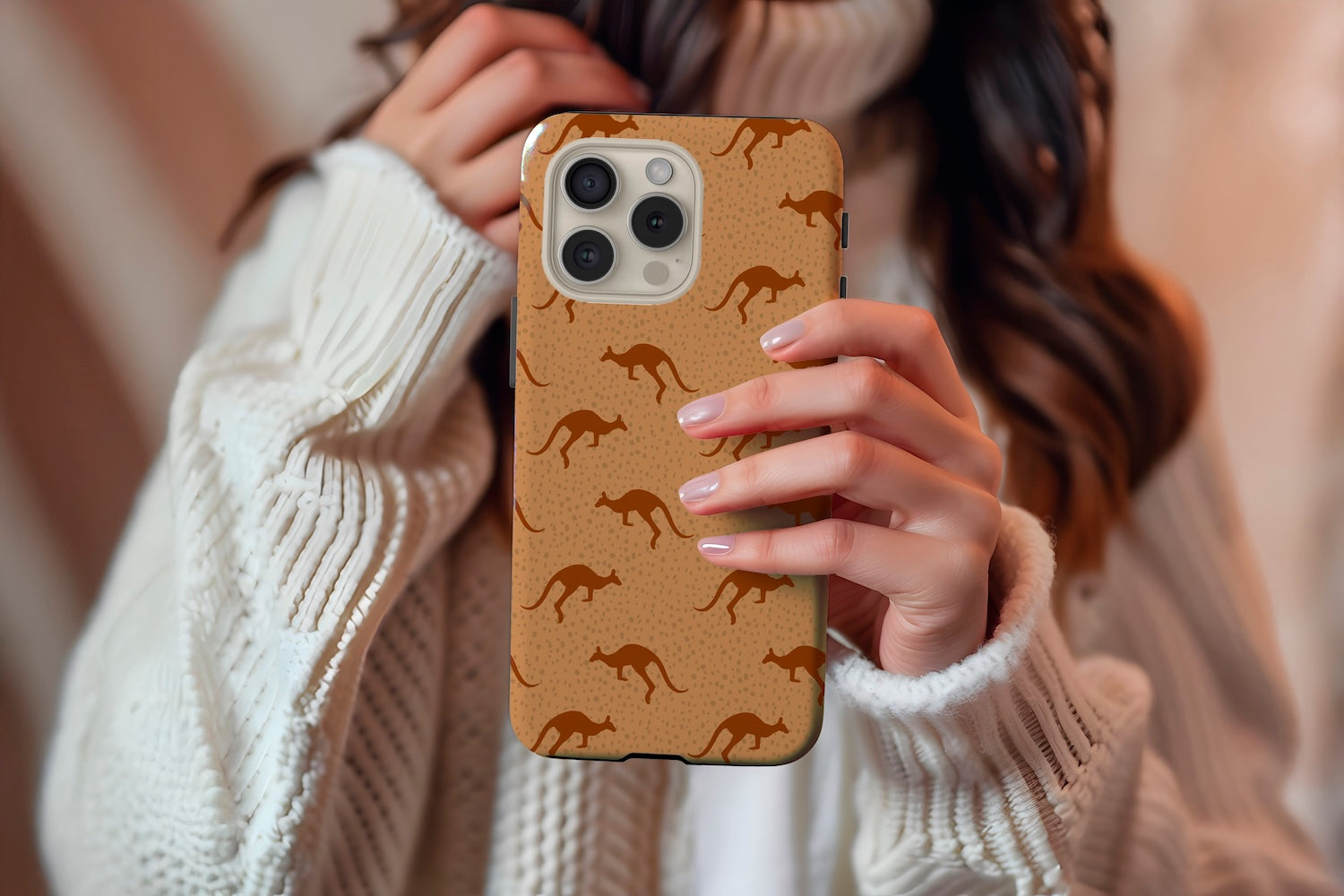 A cute girl holding our Kangaroos design phone case
